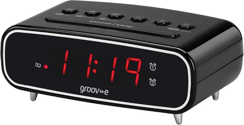 Digital alarm clock with - alarm, fm