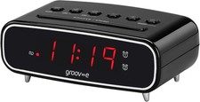 Digital alarm clock with FM